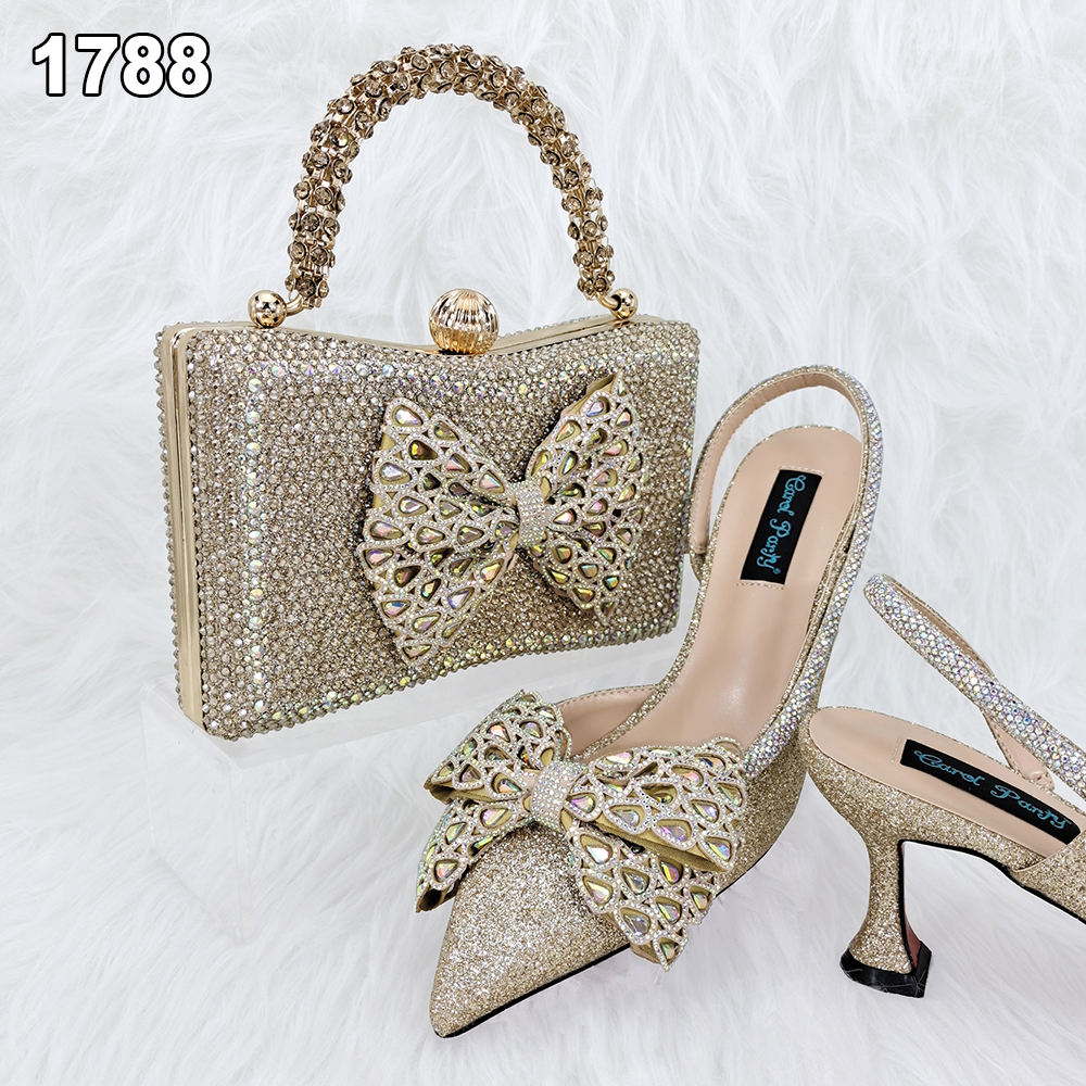 A sparkling handbag paired with gold heels.